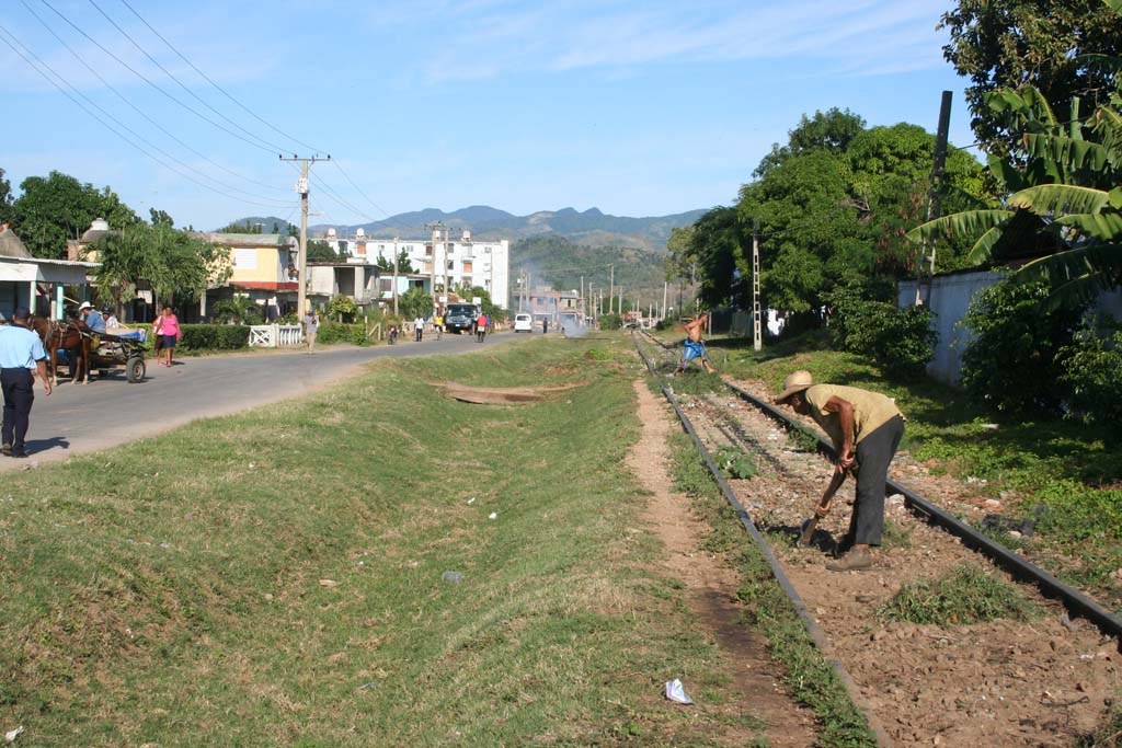 Weeding the track next to the station.