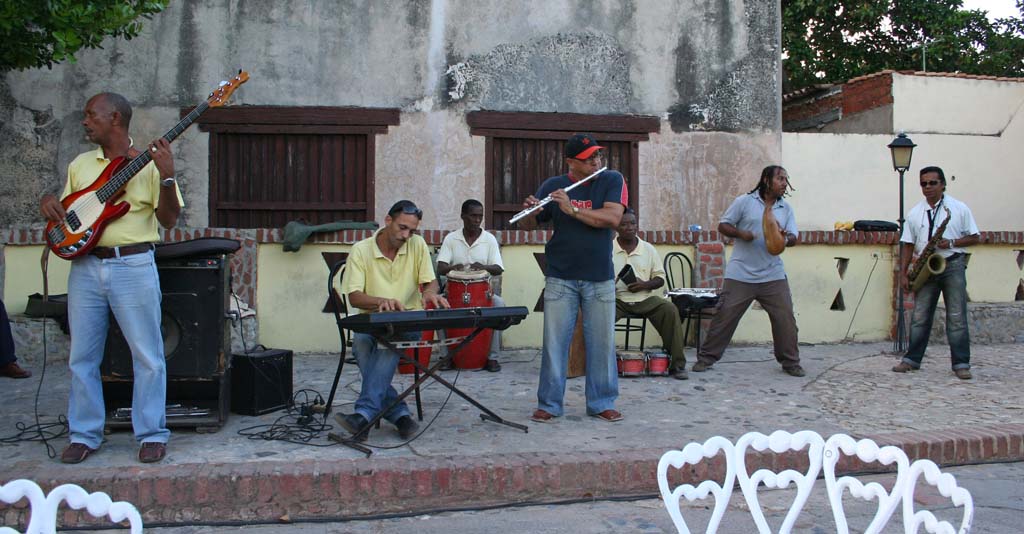 Excellent flautist, busy bass player and the keyboard player looking a bit bored with playing montuno patterns all the time.