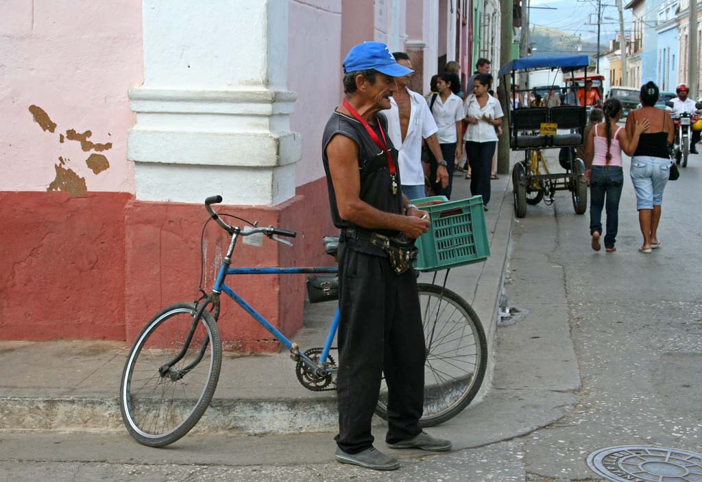 Another Trinidad street vendor - he looks a bit stressed.