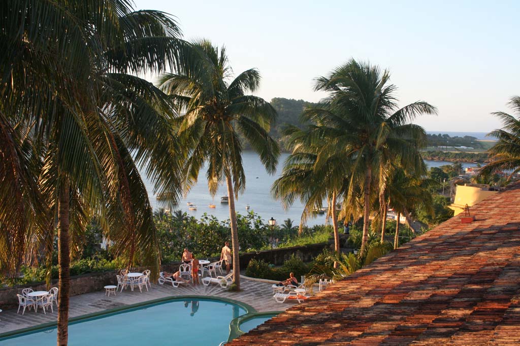 The pool at <em>El Castillo,</em> with the small bay beyond.