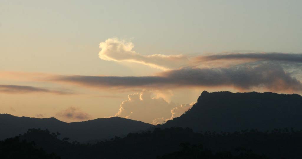 Baracoa's local mountain <em>El Yunque</em> at dusk.