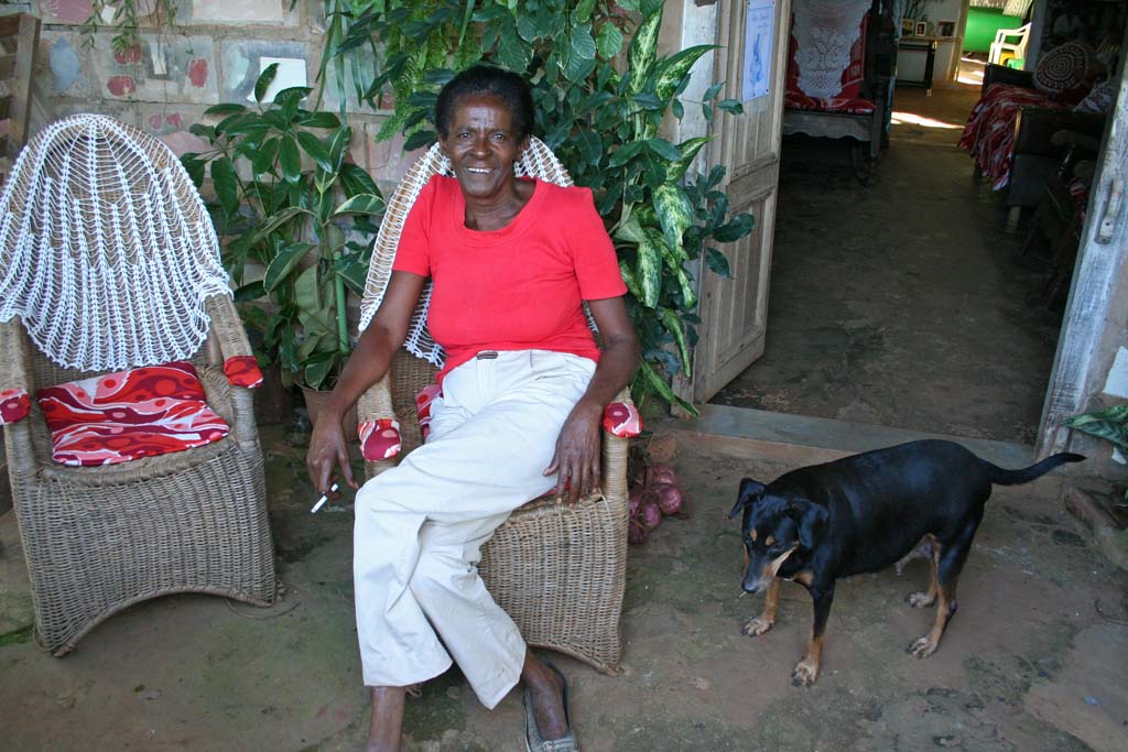 Caridad's sister, who lives here and runs the garden.