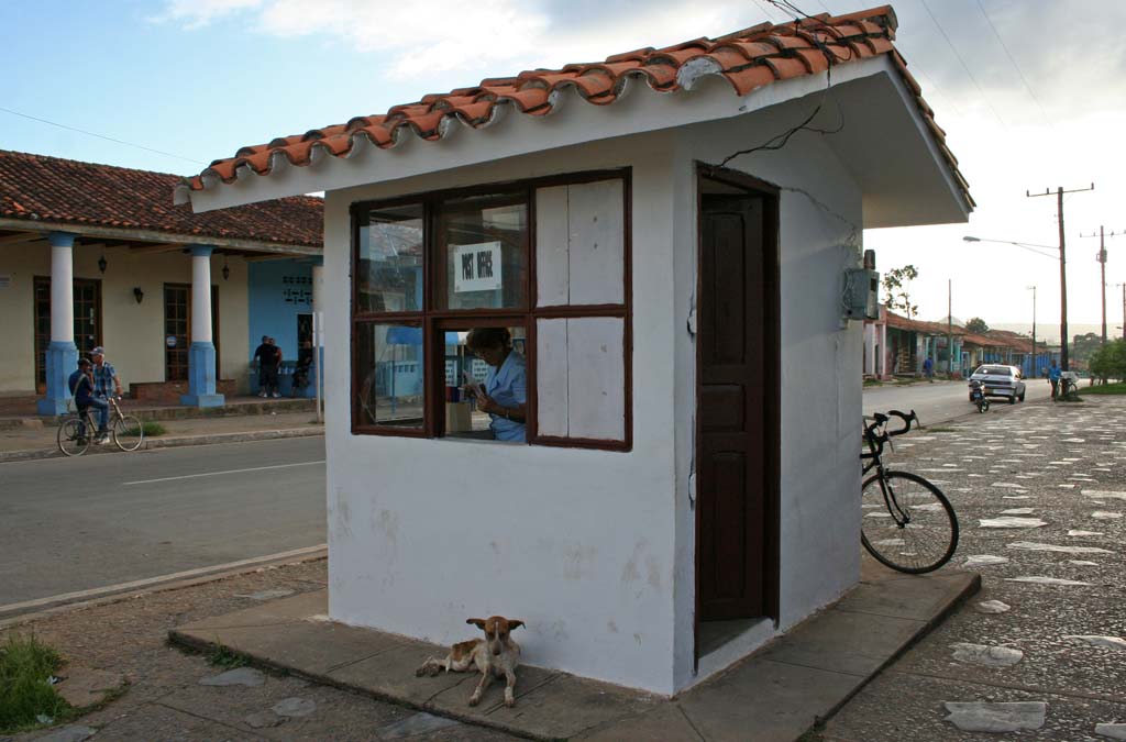 The post office at the corner of the square.