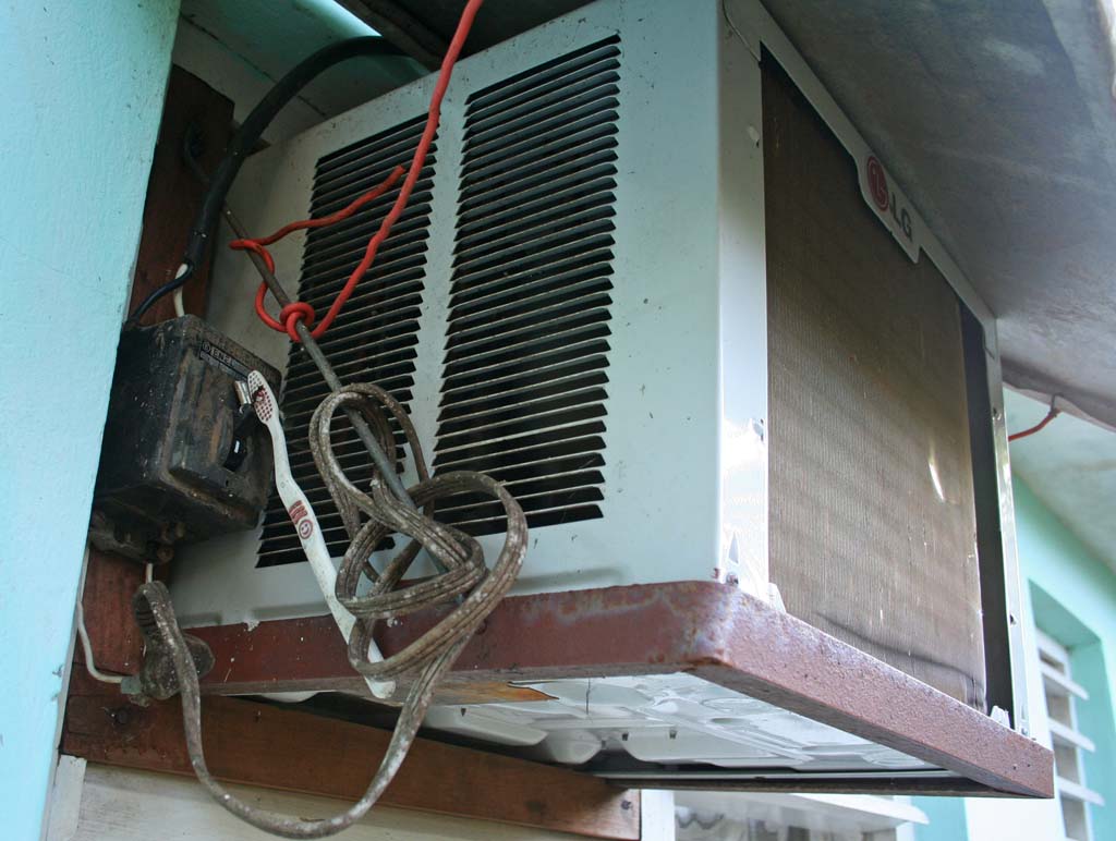 Our air conditioning unit, kept going with a toothbrush.