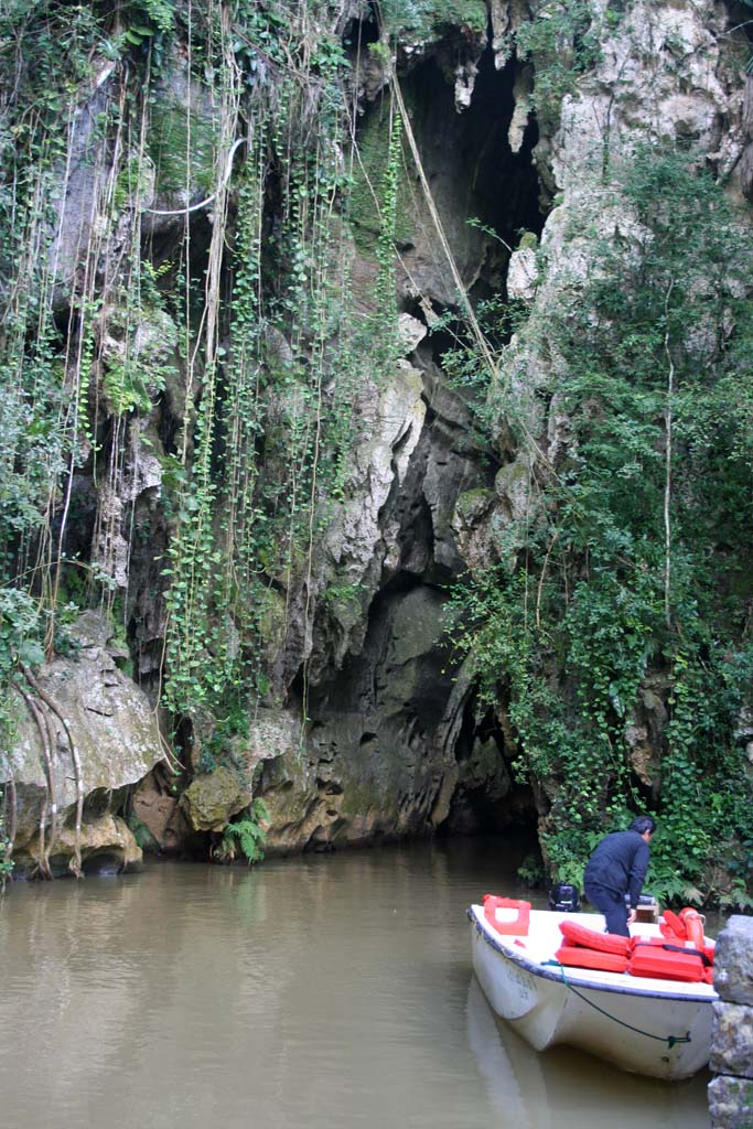 Our boat and the cave we emerged from.