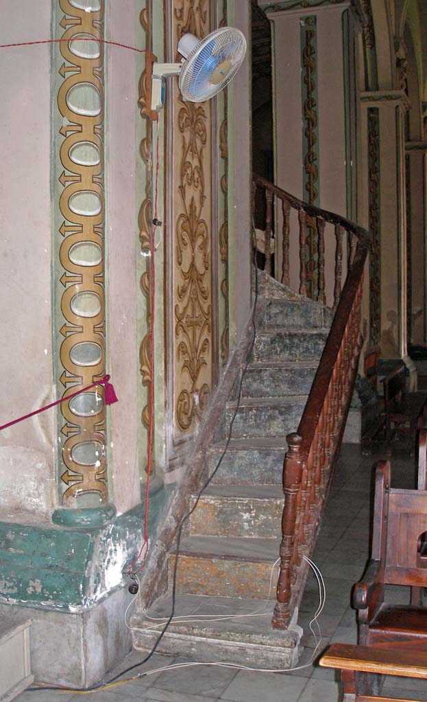 The steps to the pulpit in Santiago cathedral, with typical Cuban wiring.