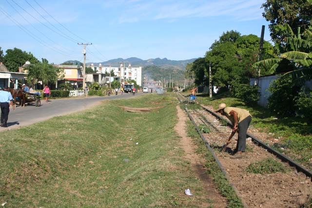 Weeding the track next to the station.