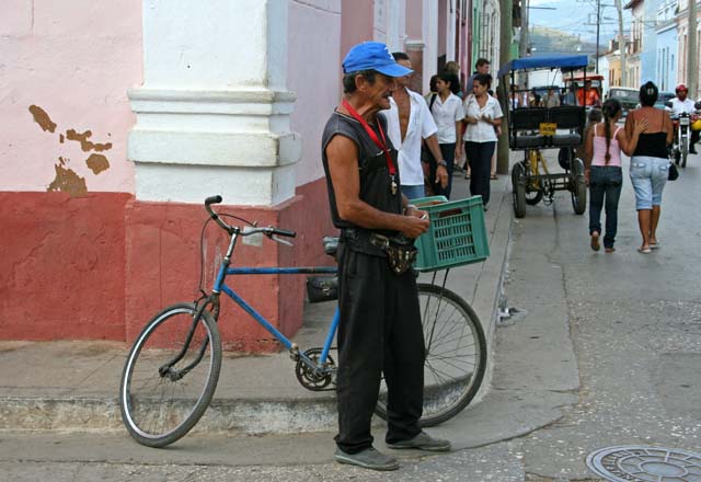 Another Trinidad street vendor - he looks a bit stressed.