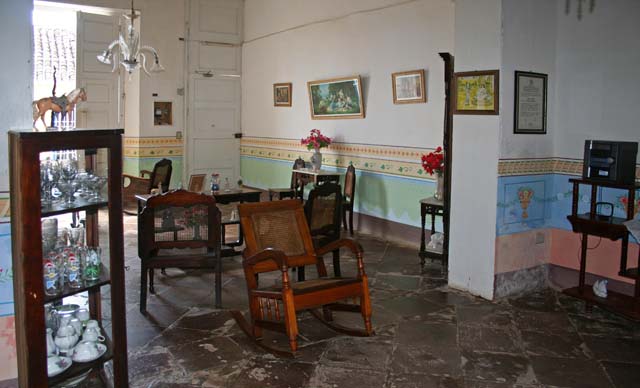 Inside the main room of the house, looking towards the street.