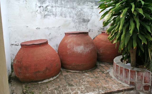 Three <em>tinajones</em> at the birthplace of Nicolás Guillén