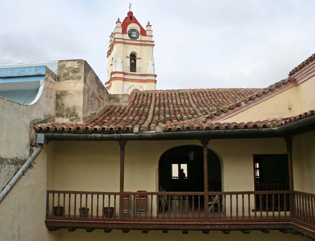 Across to the opposite balcony, with the tower of <em>Nuestra Señora de la Merced</em> behind.