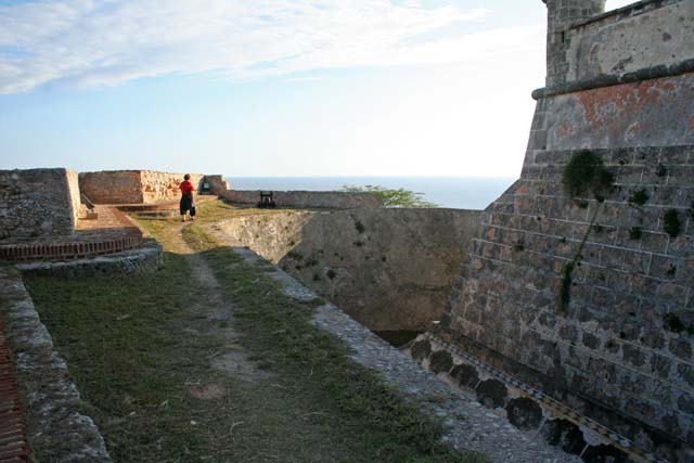 Mary walking along the fortifications.