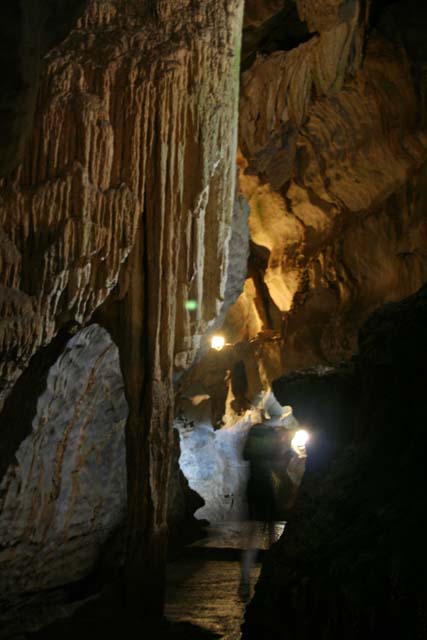 Inside the cave, leading to the water.
