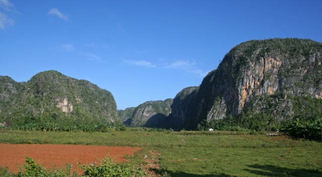 More <em>mogotes,</em> and the very red soil of the valley.