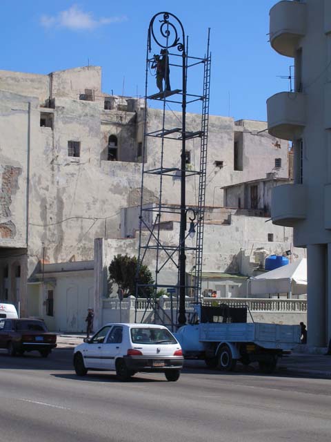 Repairing the lamps.