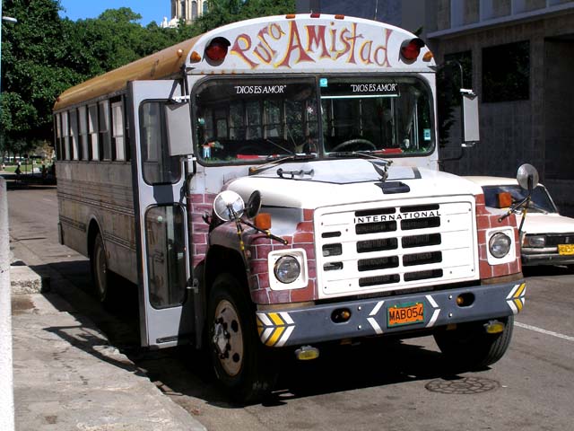 'Pure friendship', 'God is love'. A brick-built(?) bus in Havana.
