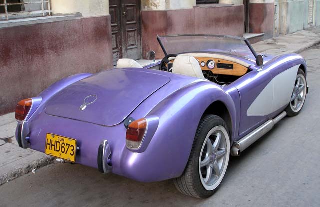 The classic cars aren't all American - here's a spiffed-up MGA in Havana.