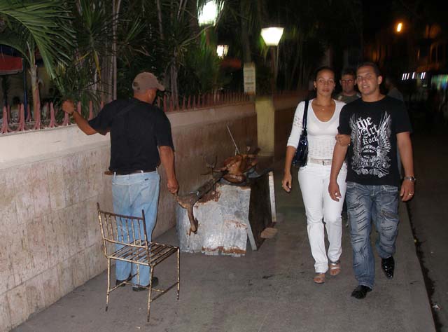 A Saturday night tradition in Camagüey: roasting pigs in the street.