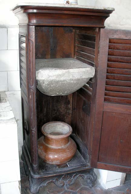 Water filter. The water worked its way through this porous stone overnight, dripping into the jar below.