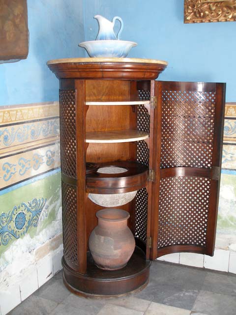 A water filter in a ventilated cabinet in the <em>Museo de Ambiente Cubano.</em>