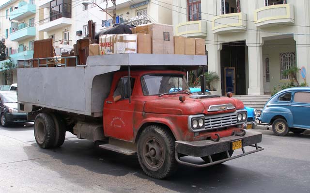 'Public Cargo Service' - an old Chevy truck still ploughing on.