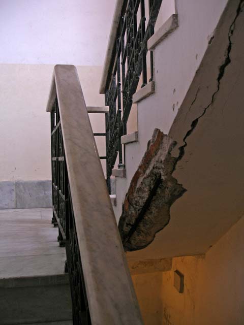 On the stairs near the top.