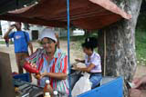 Serving a croquette in the Parque Casino Campestre in Camagüey.