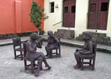 Sculpture of a group of women chatting in Plaza del Carmen, Camagüey.