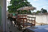 A horse and carriage waiting outside the house where we stayed in Camagüey.