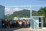 The crowd waiting to meet the bus. Our host, Daniel, is second from the left, in the striped shirt.