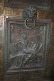 A bronze door decoration.