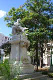 Statue of Cervantes in a small square.