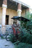 Transport and building both awaiting restoration in Vedado, Havana.