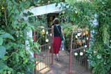 The entrance, with fruit on the gate.