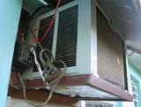 Our air conditioning unit, kept going with a toothbrush.