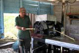 Sugar cane being crushed for the juice...