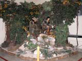 A model of the heroes Fidel and Che fighting in the mountains.