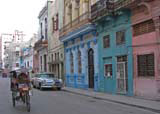 Another Habana Centro street, another bicitaxi and a classic car.