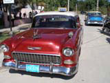 The same Chevy in all its glory (the blue car's also a Chevy).