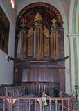 The organ, with some rather battered pipes.