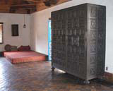 A bedroom with its colossal wardrobe.