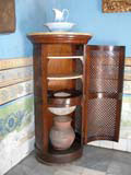 A water filter in a ventilated cabinet in the Museo de Ambiente Cubano.