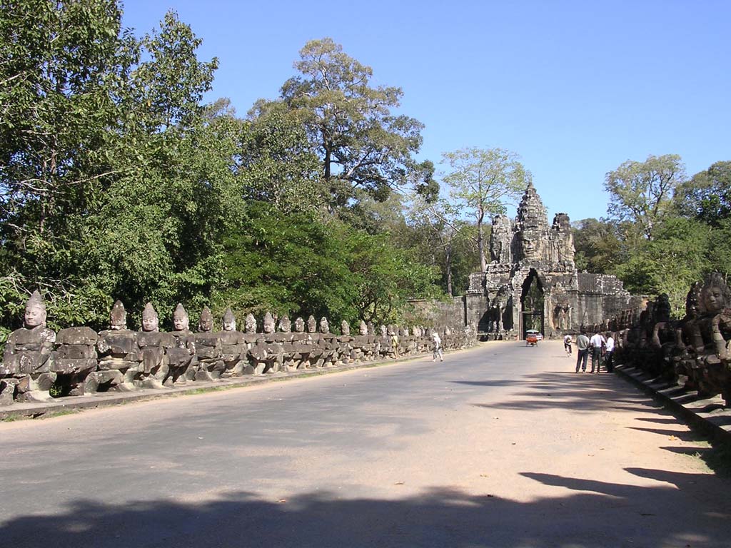 Approaching the south gate, showing some of the 54 gods on the left, busy Churning the Ocean of Milk