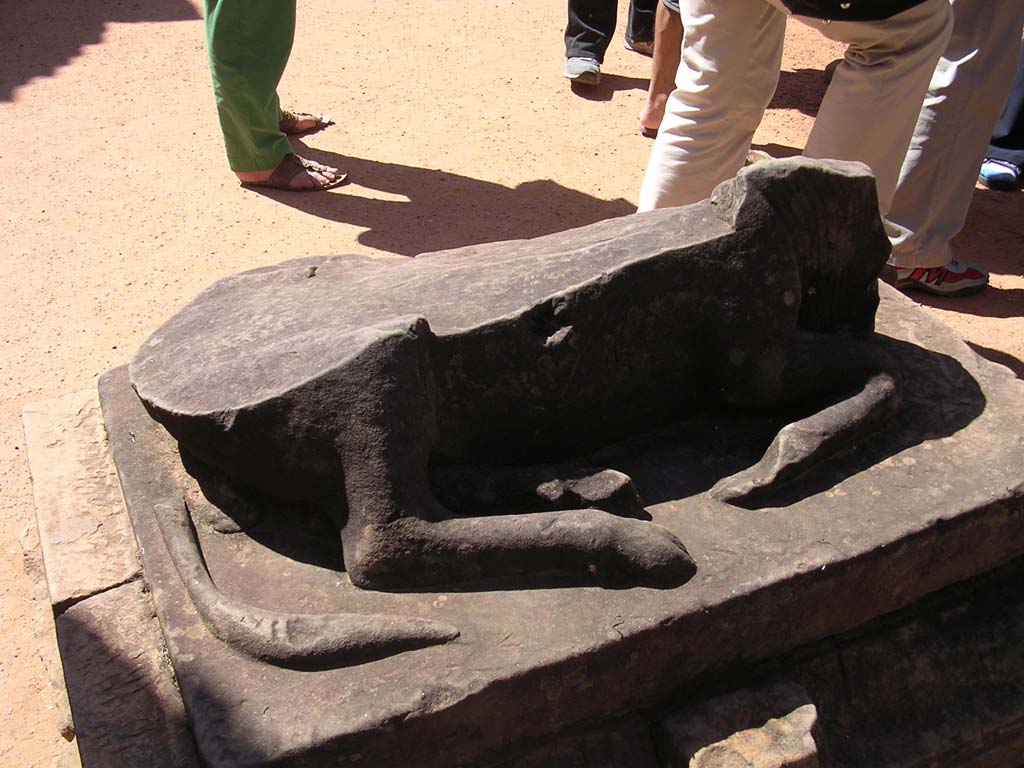 Statue of a bull (?) that was vandalised at some time in the distant past