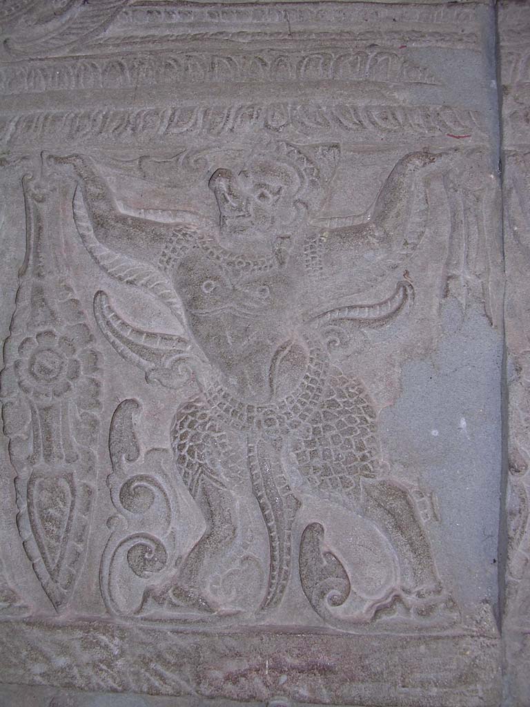 A garuda (half man, half bird) on the great bas-relief