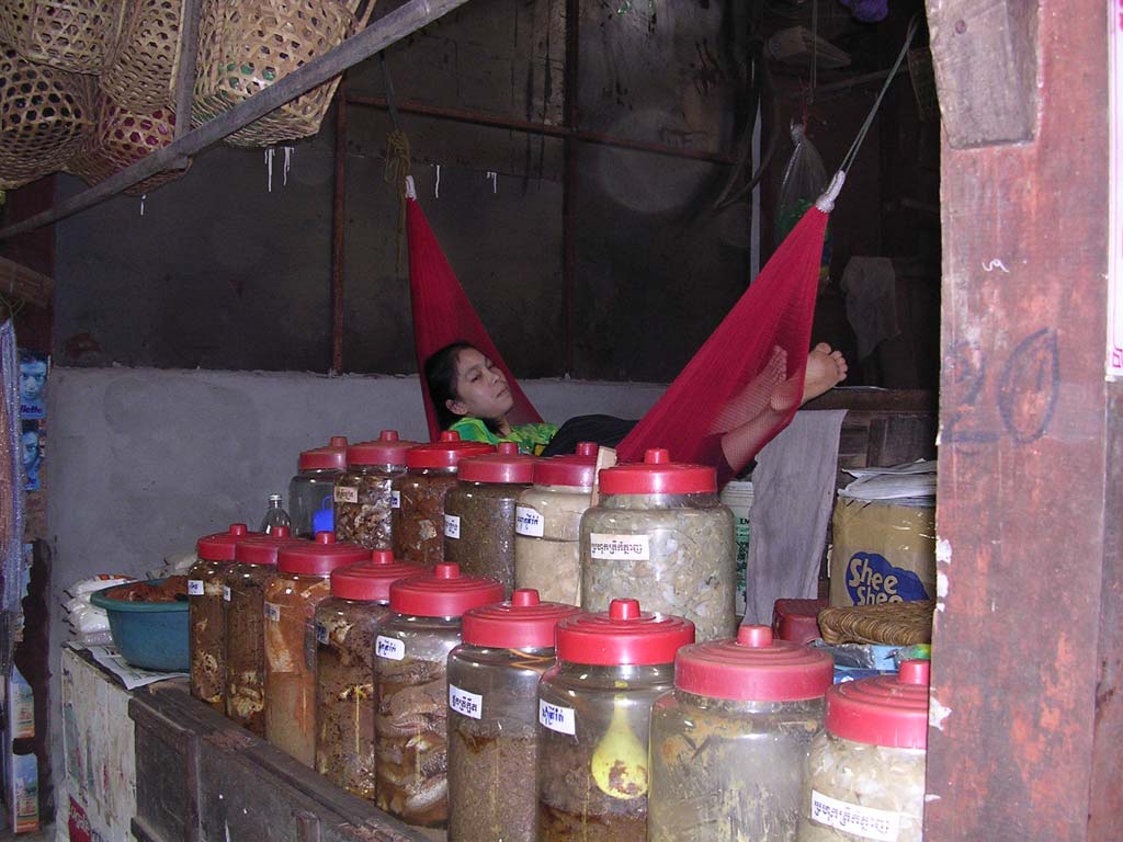 Relaxing with jars in the market