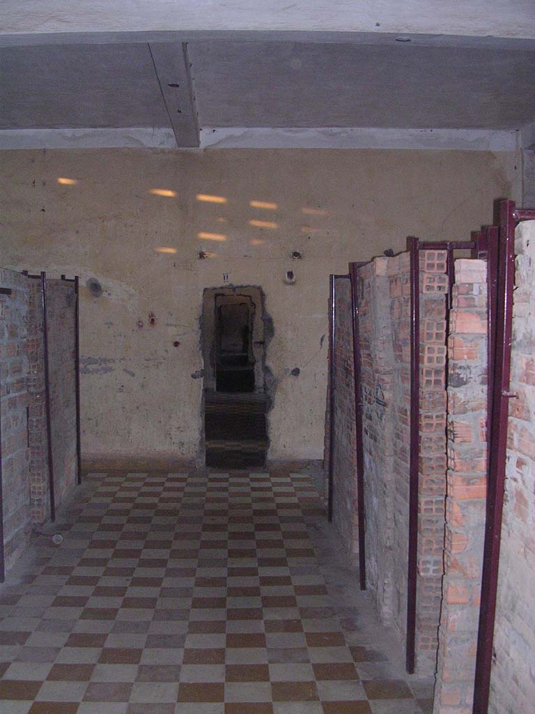 Looking through the former classrooms upstairs, where the KR built crude brick cells