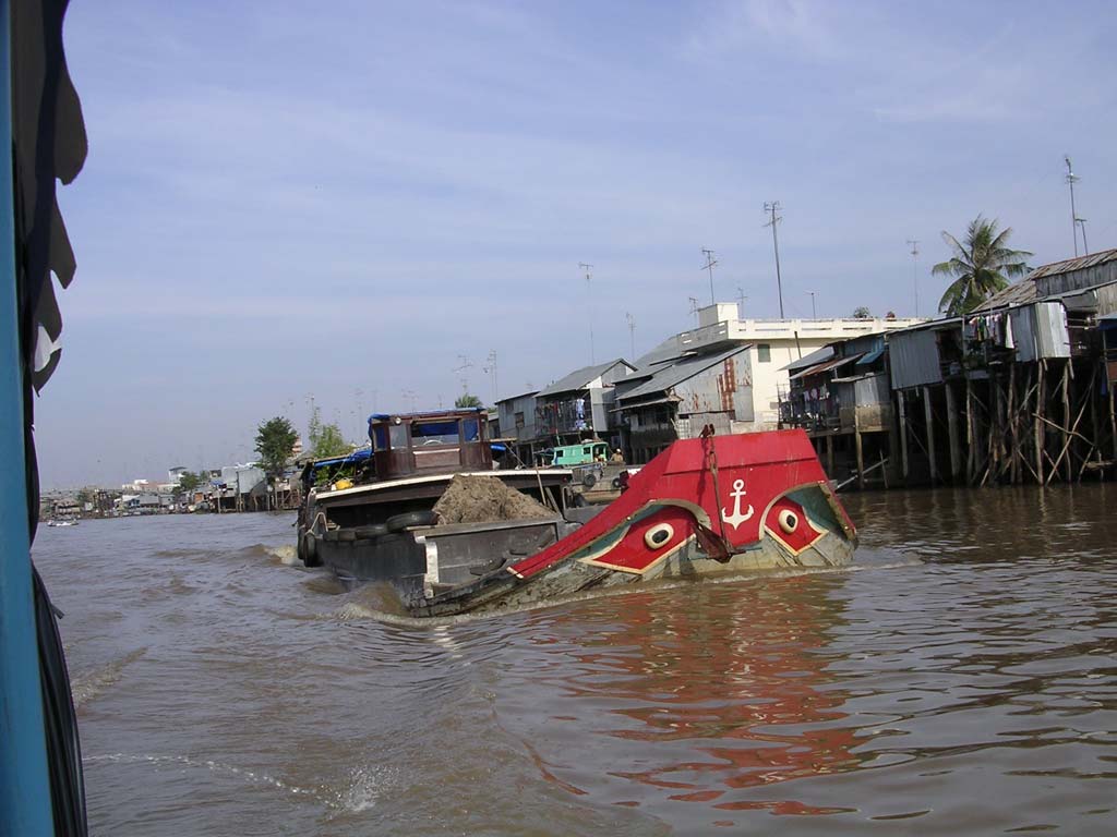 A boatload of topsoil? sand? building material? on the Mekong