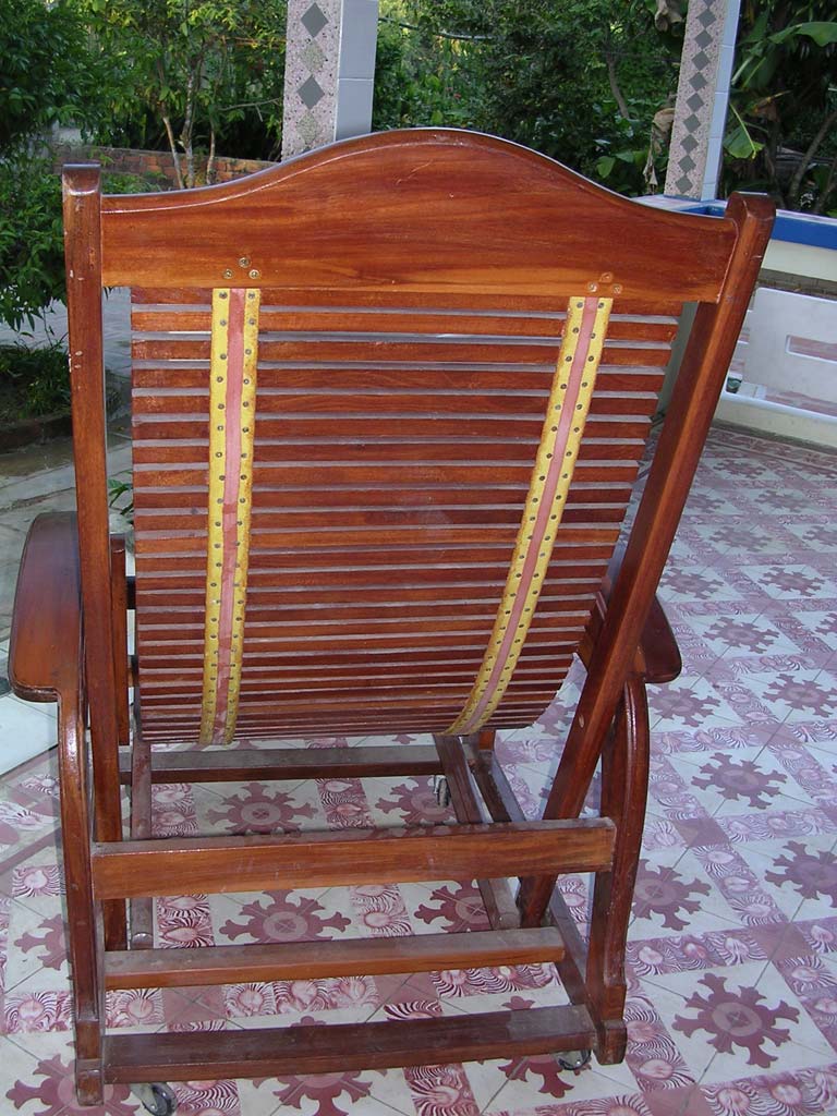 The same chair from behind, showing the canvas strips