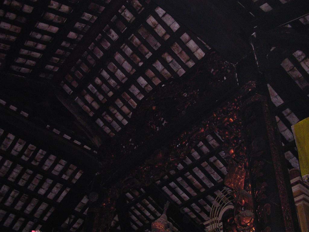 The dark roof timbers